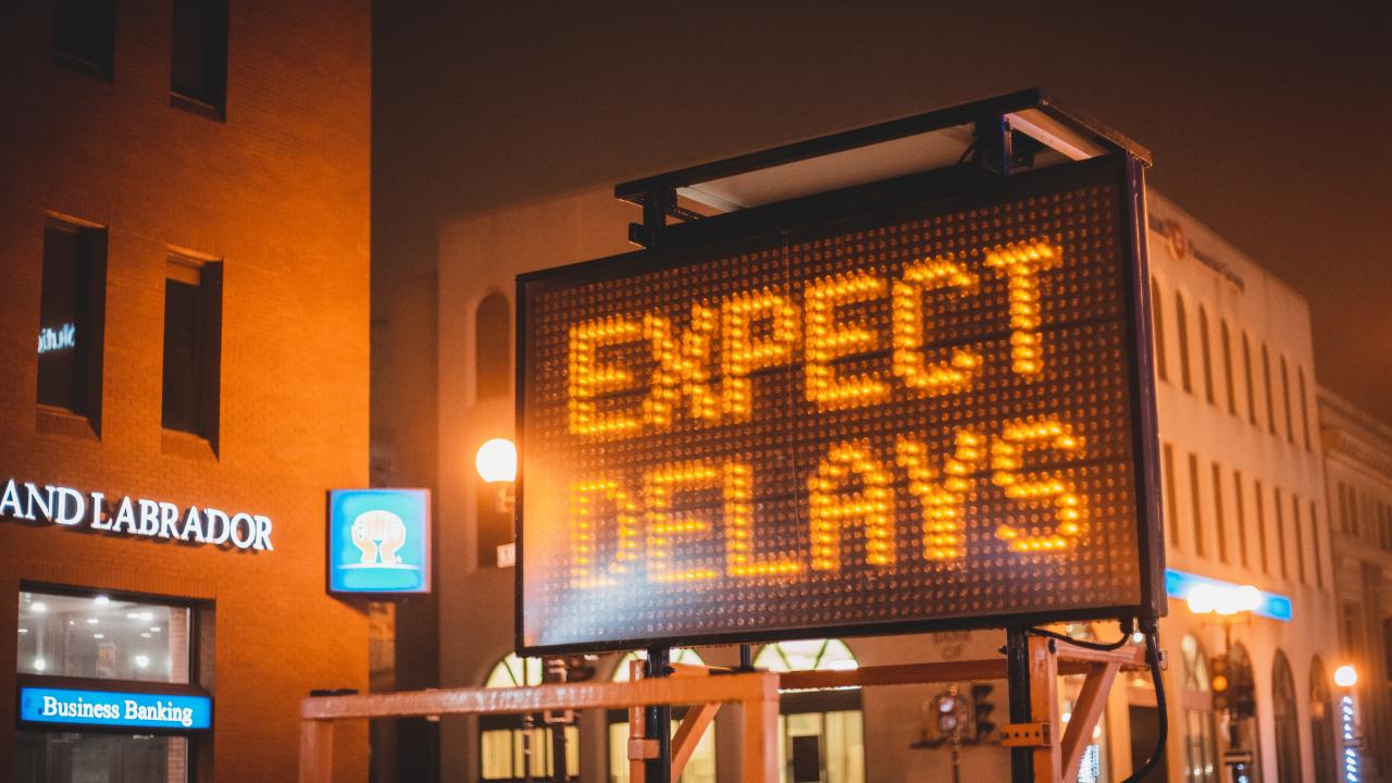 Expect Delays sign